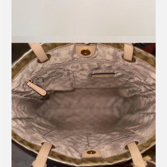 Michael Kors Women's Gold Metallic XL Tote Bag .
16” W x 11” T x 6.5” D - Picture 3 of 16